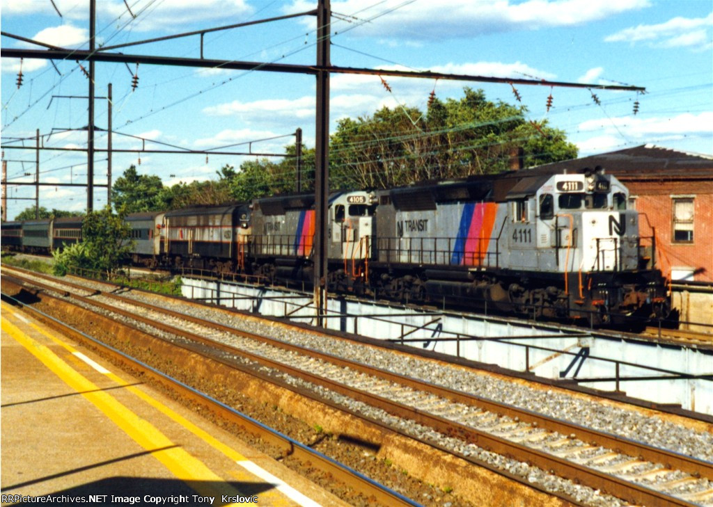 njt-4111-with-an-interesting-train-for-the-north-jersey-coast-line